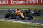 Foto zur News: Lando Norris (McLaren) und Romain Grosjean (Haas)