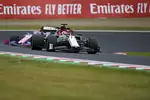 Foto zur News: Kimi Räikkönen (Alfa Romeo) und Lance Stroll (Racing Point)