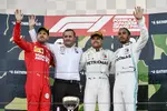 Foto zur News: Sebastian Vettel (Ferrari), Valtteri Bottas (Mercedes) und Lewis Hamilton (Mercedes)