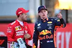 Foto zur News: Sebastian Vettel (Ferrari) und Max Verstappen (Red Bull)