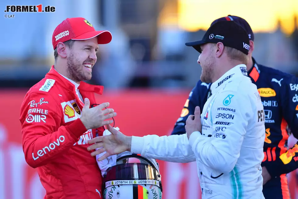 Foto zur News: Sebastian Vettel (Ferrari) und Valtteri Bottas (Mercedes)