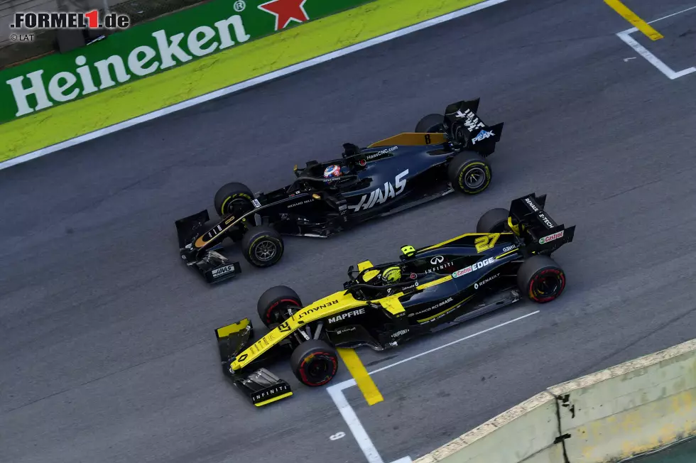 Foto zur News: Romain Grosjean (Haas) und Nico Hülkenberg (Renault)