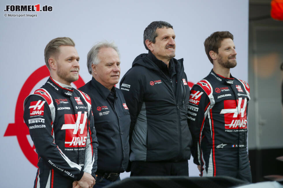 Foto zur News: Kevin Magnussen, Gene Haas, Günther Steiner und Romain Grosjean (Haas)