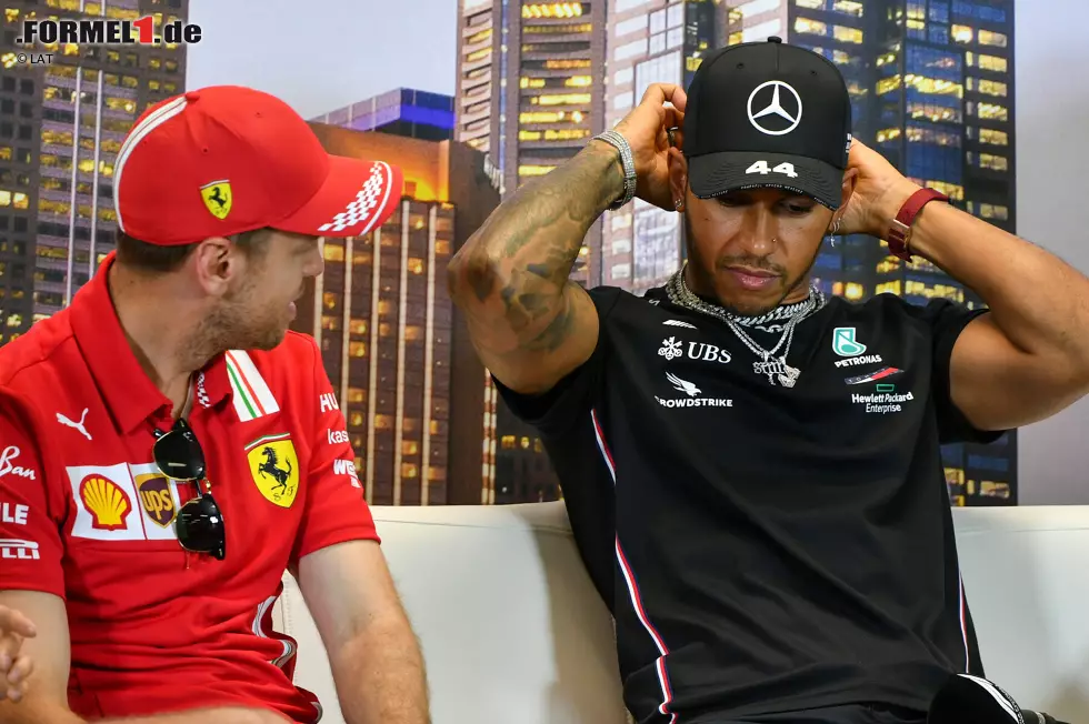 Foto zur News: Sebastian Vettel (Ferrari) und Lewis Hamilton (Mercedes)