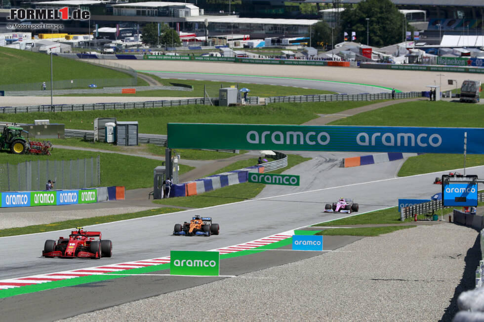 Foto zur News: Charles Leclerc (Ferrari), Carlos Sainz (McLaren) und Lance Stroll (Racing Point)