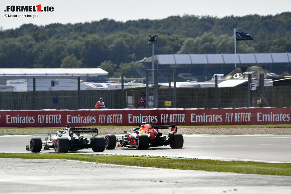 Foto zur News: Romain Grosjean (Haas) und Max Verstappen (Red Bull)