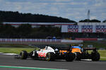 Foto zur News: Romain Grosjean (Haas) und Lando Norris (McLaren)