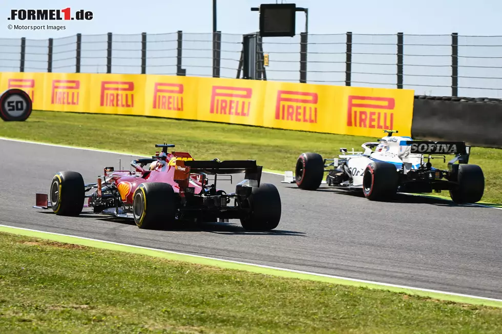 Foto zur News: Sebastian Vettel (Ferrari) und Nicholas Latifi (Williams)