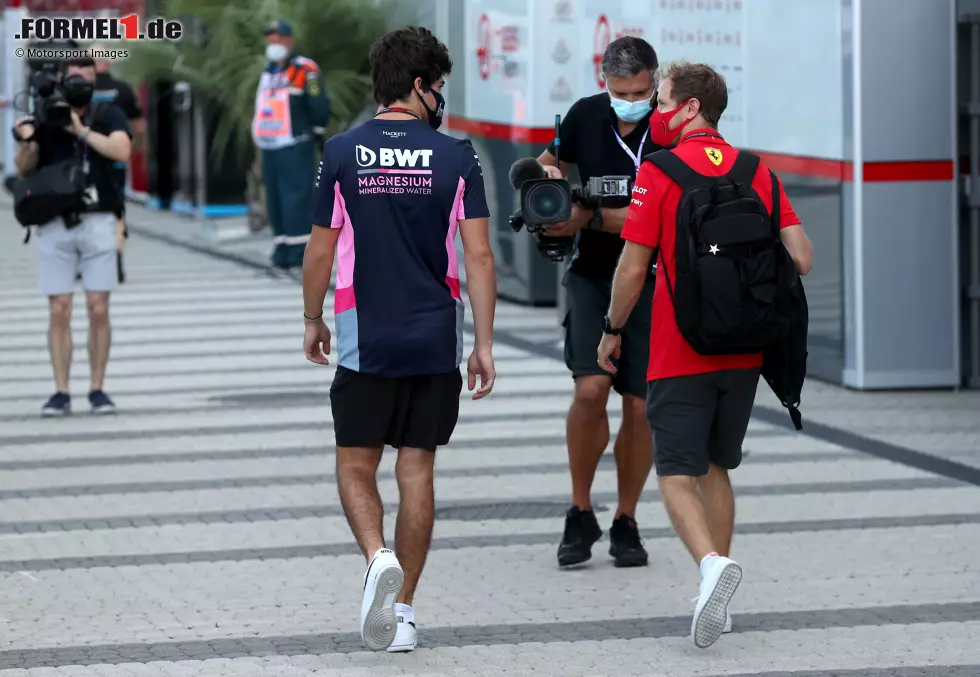 Foto zur News: Sebastian Vettel (Ferrari) und Lance Stroll (Racing Point)