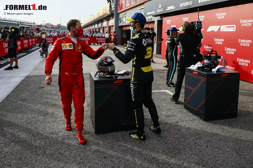 Foto zur News: Sebastian Vettel (Ferrari) und Daniel Ricciardo (Renault)