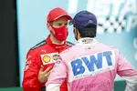 Foto zur News: Sebastian Vettel (Ferrari) und Sergio Perez (Racing Point)