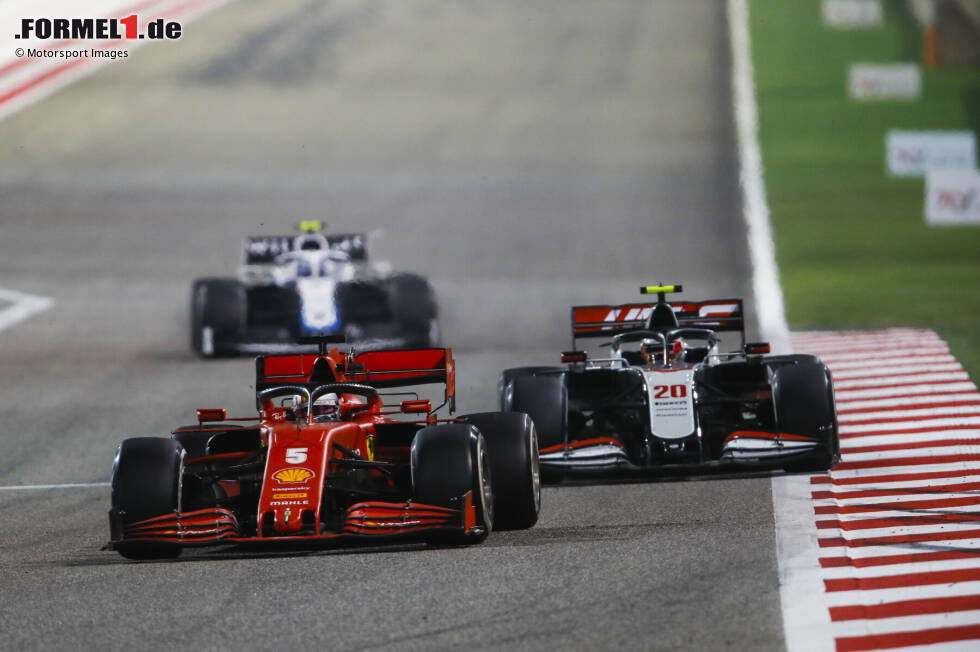 Foto zur News: Sebastian Vettel (Ferrari) und Kevin Magnussen (Haas)