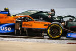 Foto zur News: Lando Norris (McLaren) und Lance Stroll (Aston Martin)