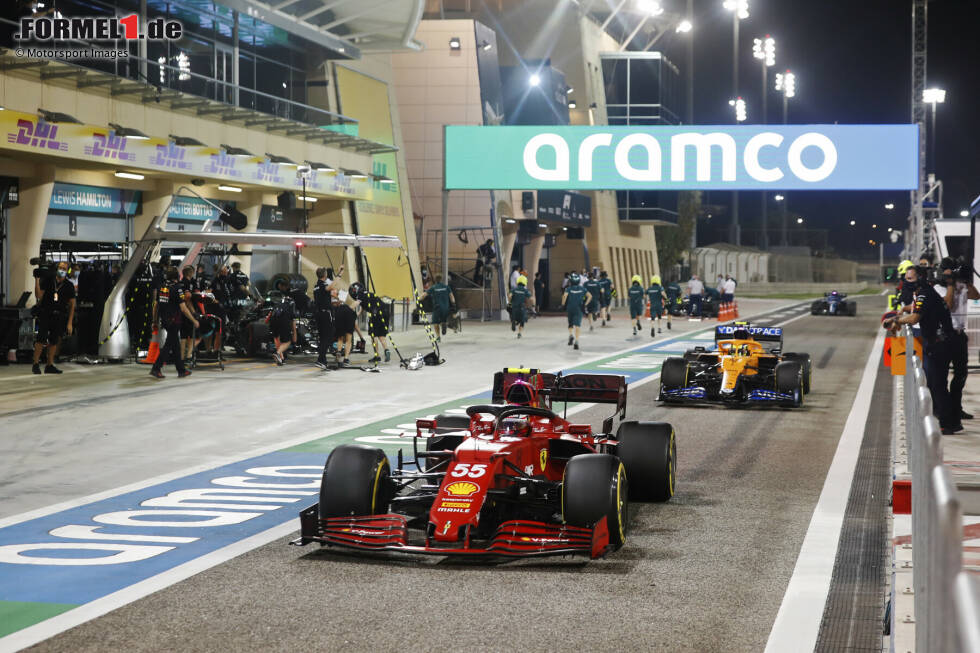 Foto zur News: Carlos Sainz (Ferrari) und Lando Norris (McLaren)