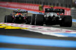 Foto zur News: Sergio Perez (Red Bull) und Valtteri Bottas (Mercedes)
