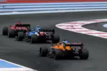 Foto zur News: Charles Leclerc (Ferrari), Esteban Ocon (Alpine) und Daniel Ricciardo (McLaren)