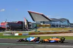 Foto zur News: Fernando Alonso (Alpine) und Lando Norris (McLaren)