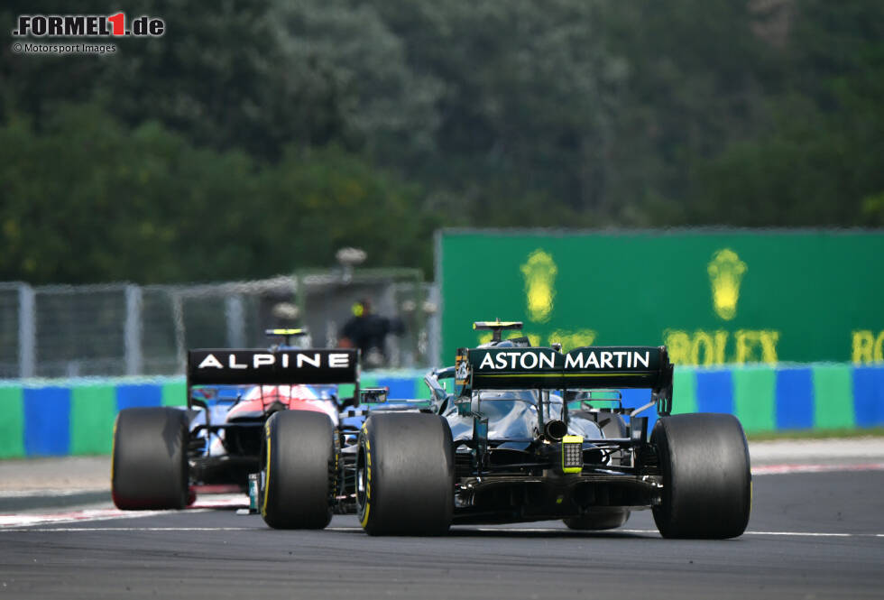 Foto zur News: Esteban Ocon (Alpine) und Sebastian Vettel (Aston Martin)