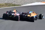 Foto zur News: Lando Norris (McLaren) und Sergio Perez (Red Bull)