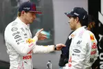 Foto zur News: Max Verstappen (Red Bull) und Sergio Perez (Red Bull)