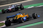 Foto zur News: Nikita Masepin (Haas) und Daniel Ricciardo (McLaren)
