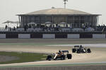 Foto zur News: Daniel Ricciardo (McLaren) und Yuki Tsunoda (AlphaTauri)