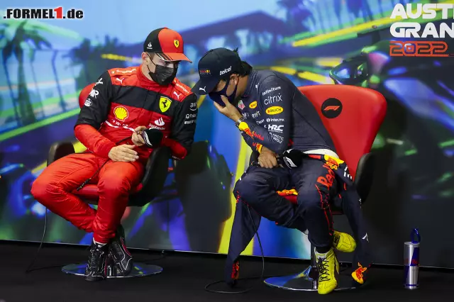 Foto zur News: Charles Leclerc (Ferrari) und Sergio Perez (Red Bull)