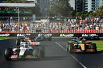 Foto zur News: Kevin Magnussen (Haas), Lando Norris (McLaren) und Daniel Ricciardo (McLaren)
