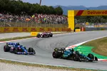 Foto zur News: Guanyu Zhou (Alfa Romeo), Sebastian Vettel (Aston Martin) und Fernando Alonso (Alpine)