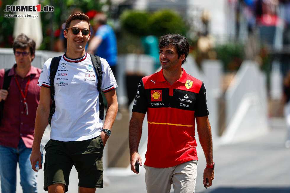 Foto zur News: Carlos Sainz (Ferrari) und George Russell (Mercedes)
