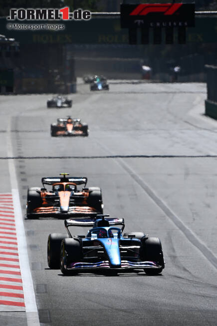 Foto zur News: Fernando Alonso (Alpine) und Lando Norris (McLaren)