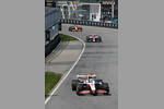 Foto zur News: Guanyu Zhou (Alfa Romeo), Mick Schumacher (Haas) und Daniel Ricciardo (McLaren)