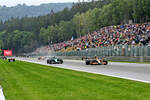 Foto zur News: Lando Norris (McLaren), Sebastian Vettel (Aston Martin) und Daniel Ricciardo (McLaren)