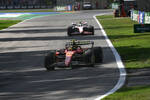 Foto zur News: Carlos Sainz (Ferrari) und Antonio Giovinazzi
