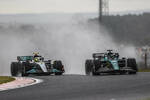 Foto zur News: Lance Stroll (Aston Martin) und Lewis Hamilton (Mercedes)