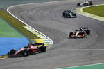 Foto zur News: Carlos Sainz (Ferrari), Lando Norris (McLaren) und Sebastian Vettel (Aston Martin)