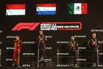 Foto zur News: Charles Leclerc (Ferrari), Max Verstappen (Red Bull) und Sergio Perez (Red Bull)