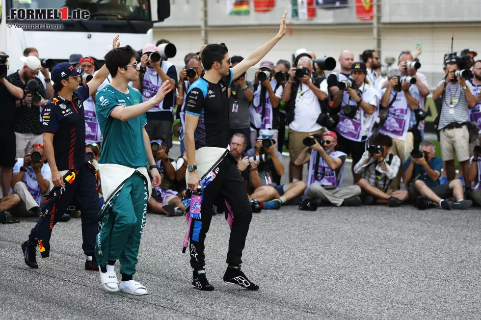 Foto zur News: Lance Stroll (Aston Martin) und Esteban Ocon (Alpine)