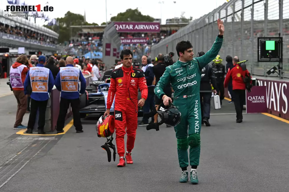 Foto zur News: Carlos Sainz (Ferrari) und Lance Stroll (Aston Martin)