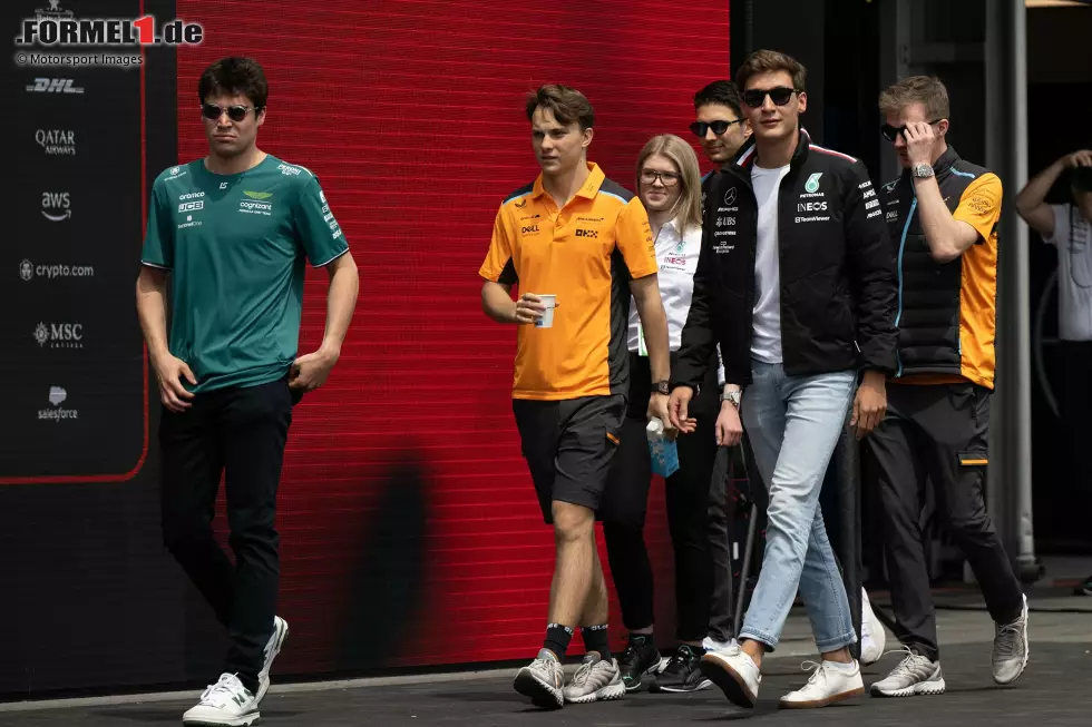 Foto zur News: Lance Stroll (Aston Martin), Oscar Piastri (McLaren) und George Russell (Mercedes)