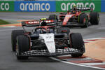 Foto zur News: Yuki Tsunoda (AlphaTauri) und Carlos Sainz (Ferrari)