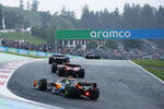 Foto zur News: Esteban Ocon (Alpine), Charles Leclerc (Ferrari) und Lando Norris (McLaren)