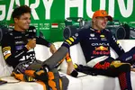 Foto zur News: Lando Norris (McLaren) und Max Verstappen (Red Bull)