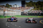 Foto zur News: Nico Hülkenberg (Haas) und Daniel Ricciardo (Racing Bulls)