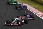Foto zur News: Kevin Magnussen (Haas), Daniel Ricciardo (Racing Bulls) und Yuki Tsunoda (Racing Bulls)