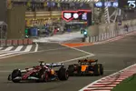Foto zur News: Charles Leclerc (Ferrari) und Lando Norris (McLaren)