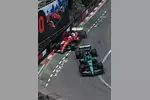Foto zur News: Charles Leclerc (Ferrari) und Lance Stroll (Aston Martin)