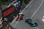 Foto zur News: Charles Leclerc (Ferrari) und Lance Stroll (Aston Martin)