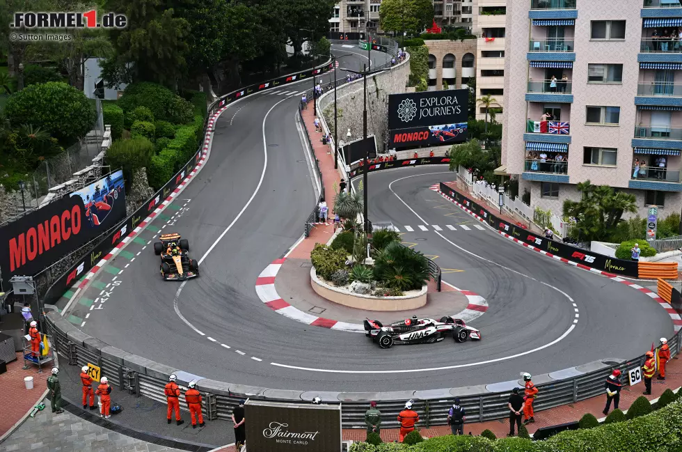 Foto zur News: Esteban Ocon (Haas) und Lando Norris (McLaren)