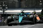 Foto zur News: Lance Stroll (Aston Martin) und Lando Norris (McLaren)